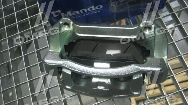 Супорт гальмівний (вир-во Mando) MANDO EX581102B700 (фото 1)
